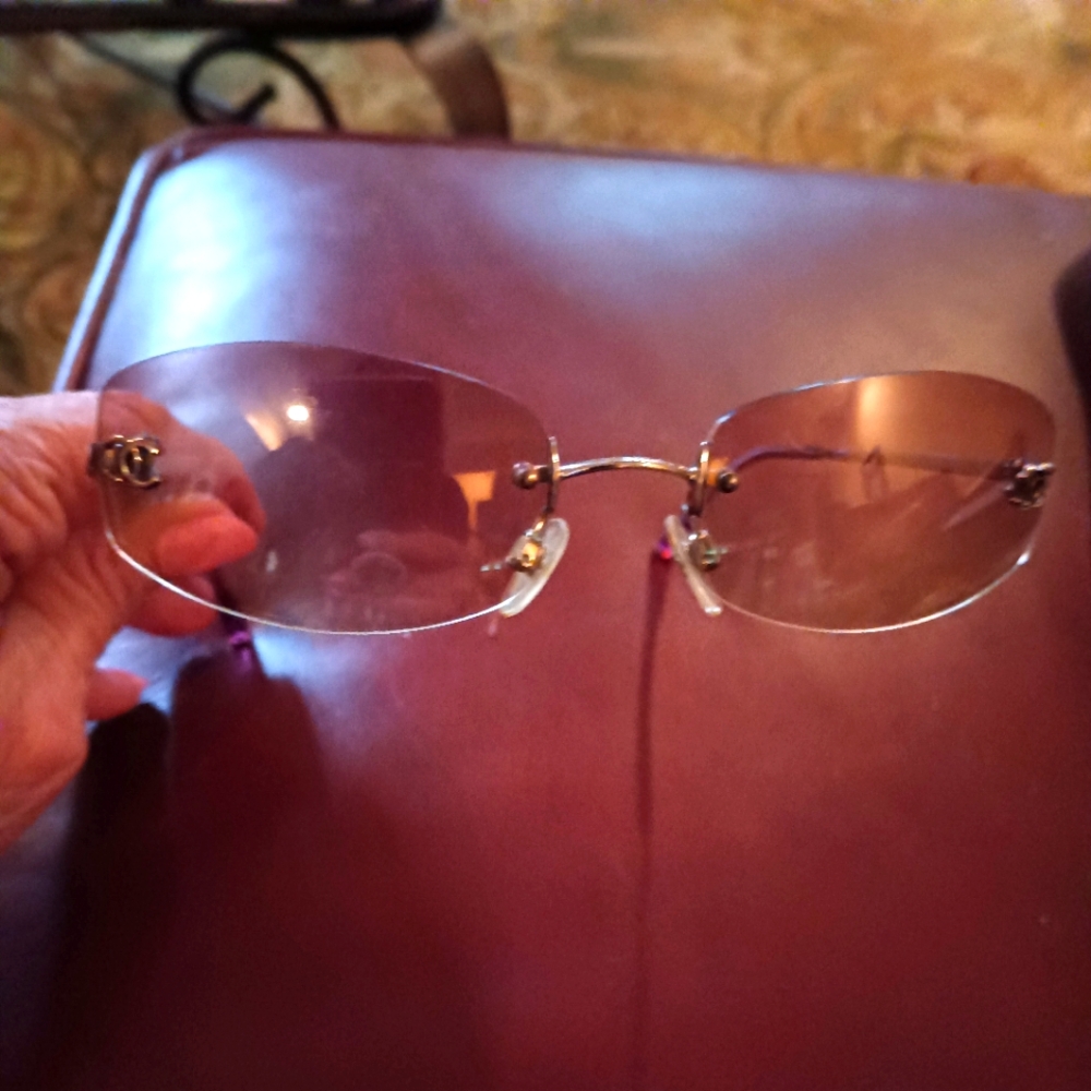 Elegant Chanel Lite Amber Rimless Sunglasses